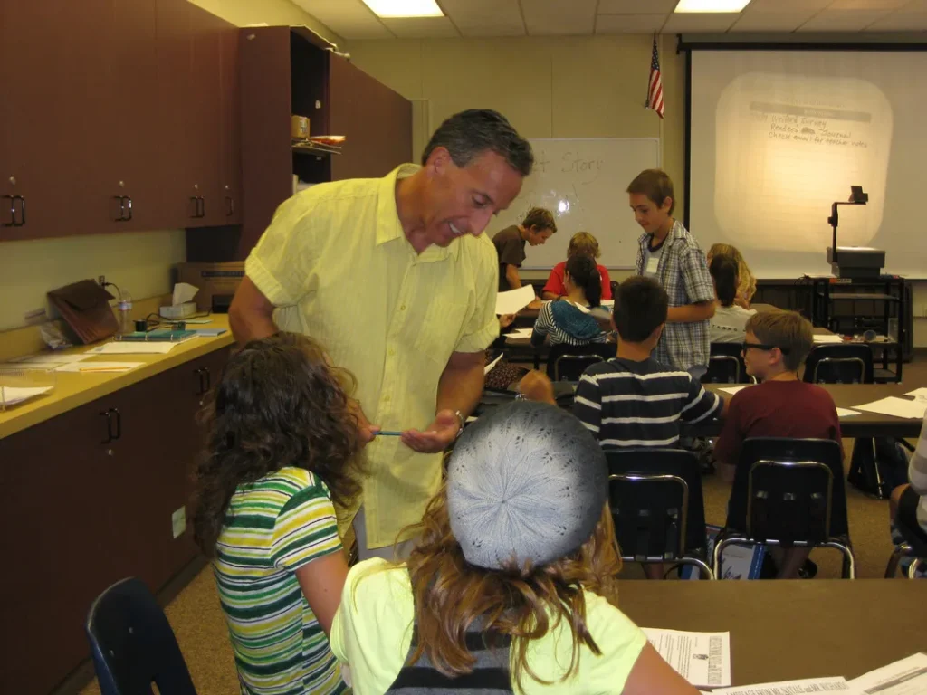 Teacher instructing students