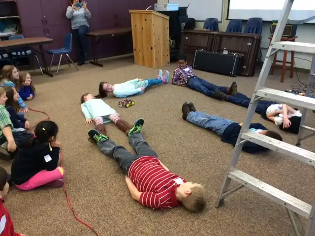 Student laying on the floor