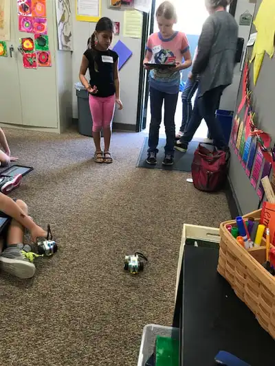 students building with legos
